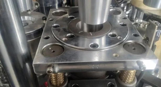 Bottom Punching Mechanism